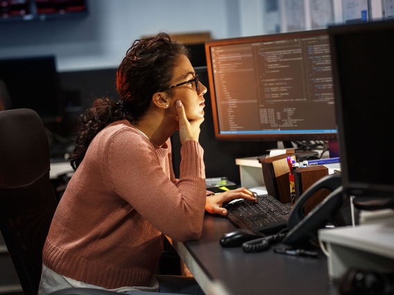 Developer working on her computer