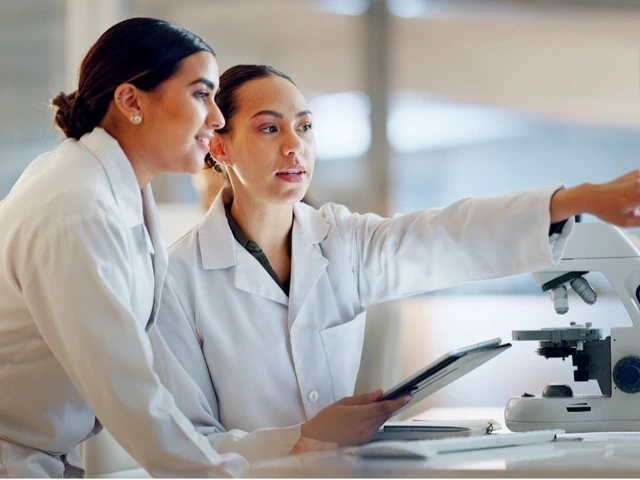 Two scientists in lab coats examine data
